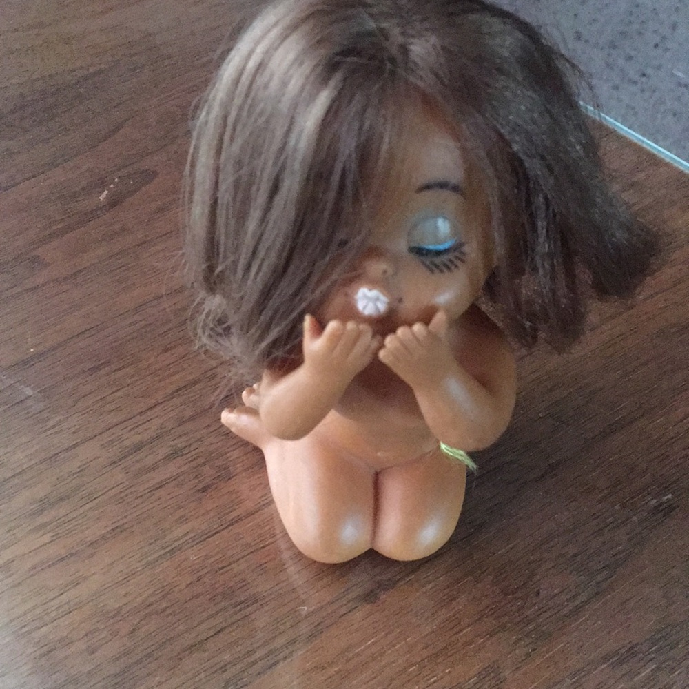 Vintage plastic Hawaiian kissing doll